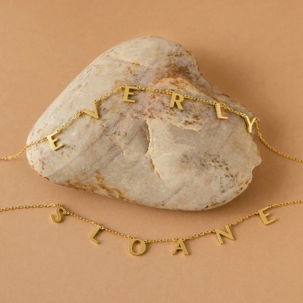 Collier initiales et symboles Vita